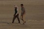 Paleontologist and Geologist inspect the fosil trackway