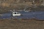 Partially submerged van