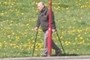 Man walking with crutches