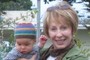 Smiling woman with a super-cute baby
