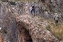 fault surface on limestone behind conglomerates